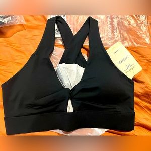 Fabletics Oasis Twist Front Soirts Bra Black size Large. There are 2 available.